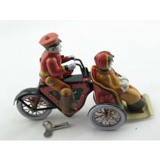 Blechspielzeug - Motorraddroschke, Mann und Frau