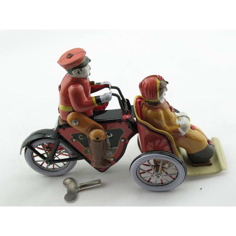 Blechspielzeug - Motorraddroschke, Mann und Frau
