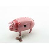 Blechspielzeug - Schwein Polly mit roter Schleife