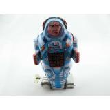 Blechspielzeug - Roboter-Astronaut mit Feuerstein auf Raupenfüßen